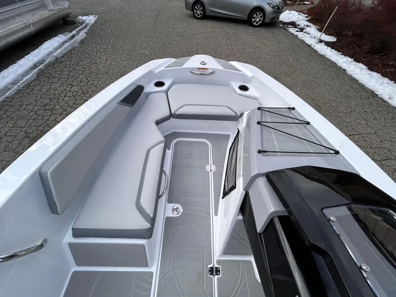 Slide: The Image of Open storage compartment in 2025 Scarab 165 SE boat. - 23