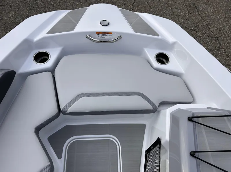 Slide: The Image of Engine compartment of 2025 Scarab 165 SE boat with visible components and fire extinguisher. - 28