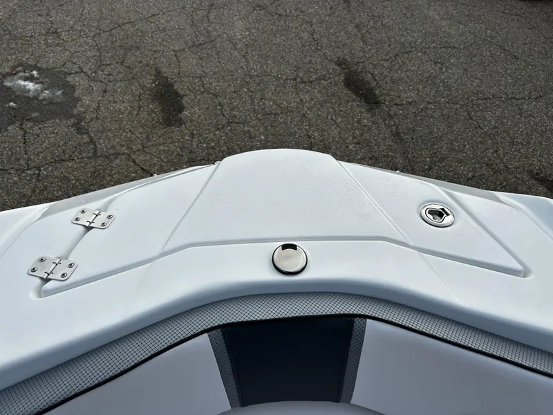 Slide: The Image of 2024 Scarab 215 Wake LE boat bow with white and gray upholstery. - 30