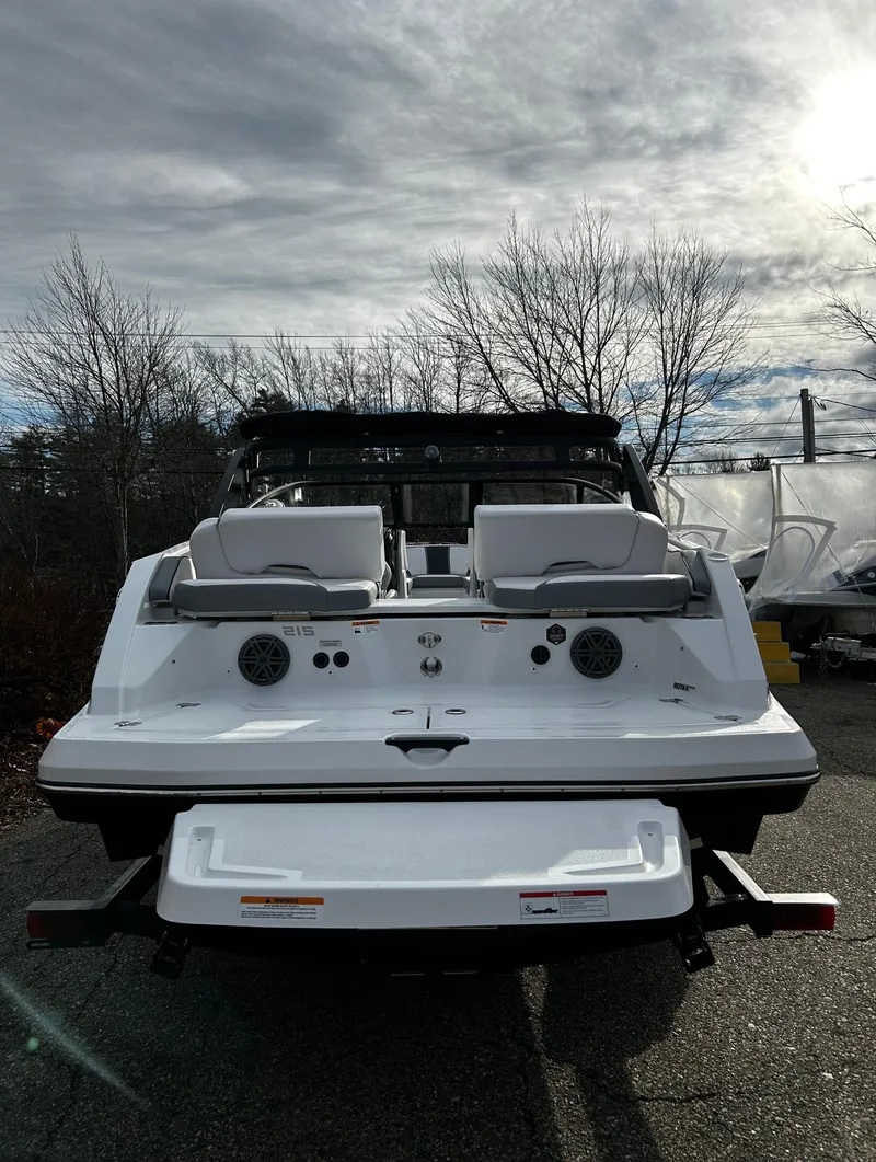 Slide: The Image of 2024 Scarab 215 Wake LE boat rear view with seating and speakers. - 40