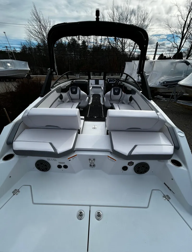 Slide: The Image of 2024 Scarab 215 Wake LE boat with white interior and dual seating. - 44