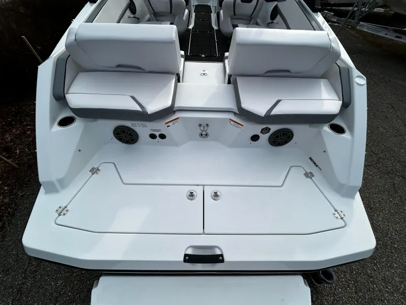 Slide: The Image of 2024 Scarab 215 Wake LE boat rear seating and deck area. - 6