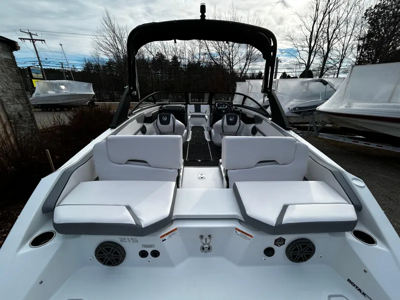 Slide: The Image of 2024 Scarab 215 Wake LE boat with white seating and black accents. - 8