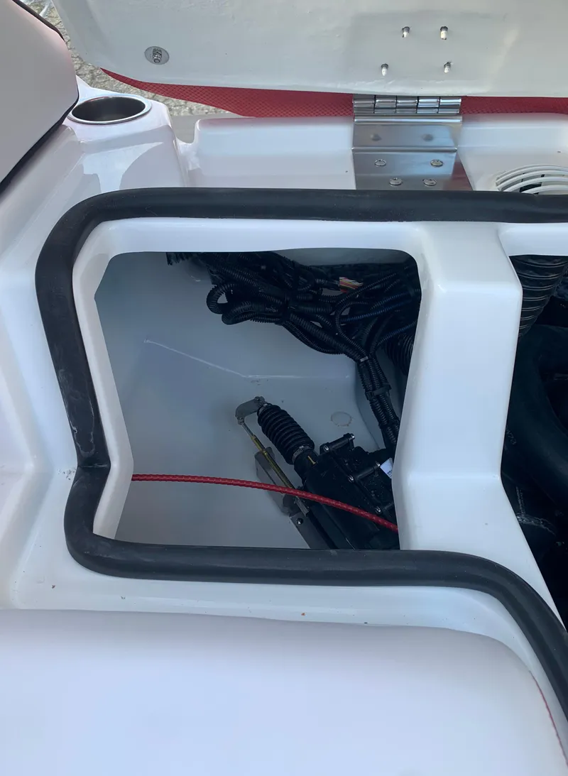 Slide: The Image of 2023 Scarab 195 ID engine compartment with wiring and components. - 12