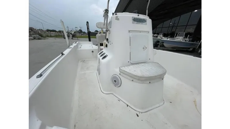 Slide: The Image of 2005 Sea Fox 205 Bay Fisher boat interior with console and seating. - 2