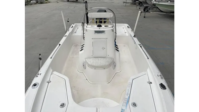 Slide: The Image of 2005 Sea Fox 205 Bay Fisher boat, white interior, center console, spacious deck, ideal for fishing. - 5