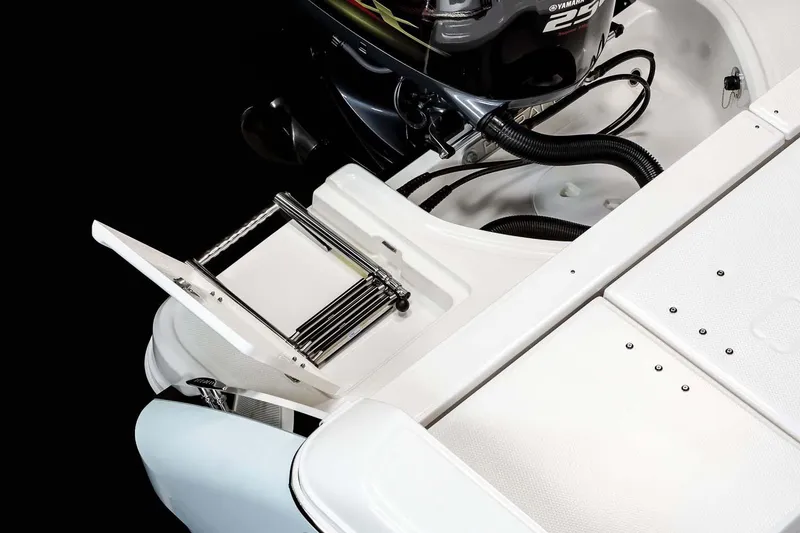 Slide: The Image of Manufacturer Provided Image: 2022 Robalo R230 Center Console boat with a foldable swim ladder. - 34