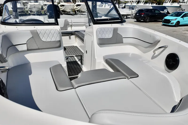 Slide: The Image of 2025 Bayliner VR4 Bowrider OB interior with sleek seating and modern design. - 6