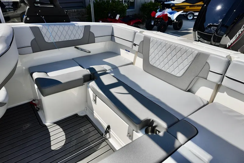Slide: The Image of 2025 Bayliner VR4 Bowrider OB interior with gray seating and modern design. - 7