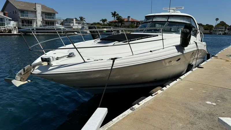Slide: The Image of 2007 Sea Ray 44 Sundancer yacht docked in a sunny marina. - 12
