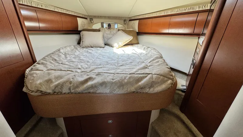 Slide: The Image of Luxurious cabin interior of 2007 Sea Ray 44 Sundancer yacht with cozy bedding. - 13