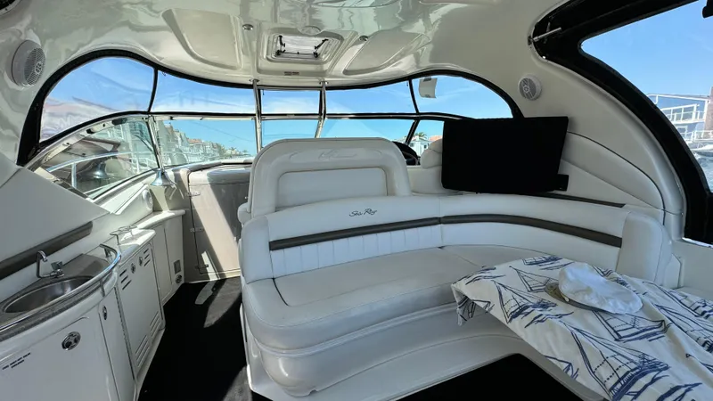 Slide: The Image of Interior of 2007 Sea Ray 44 Sundancer yacht with white seating and nautical decor. - 14