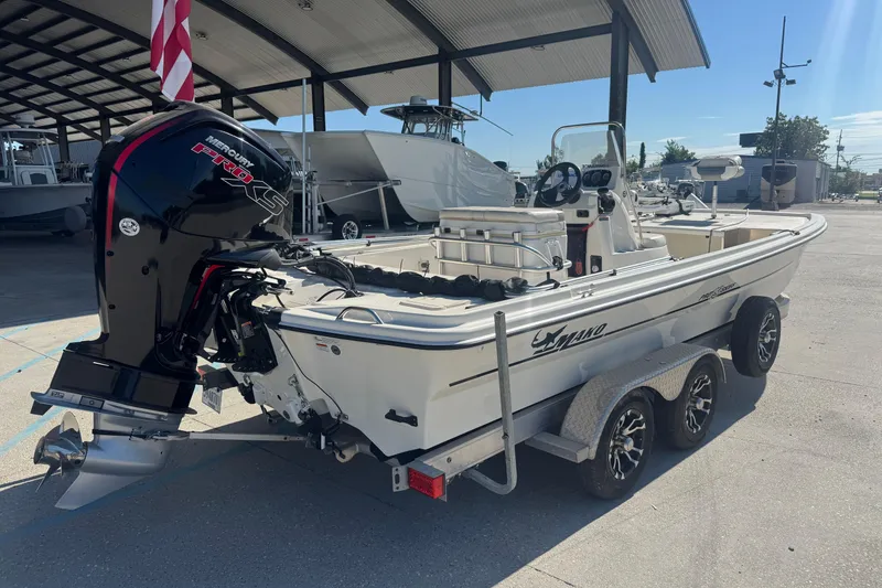 Slide: The Image of 2021 Mako Pro Skiff 19 CC boat on trailer with Mercury Pro XS engine. - 5