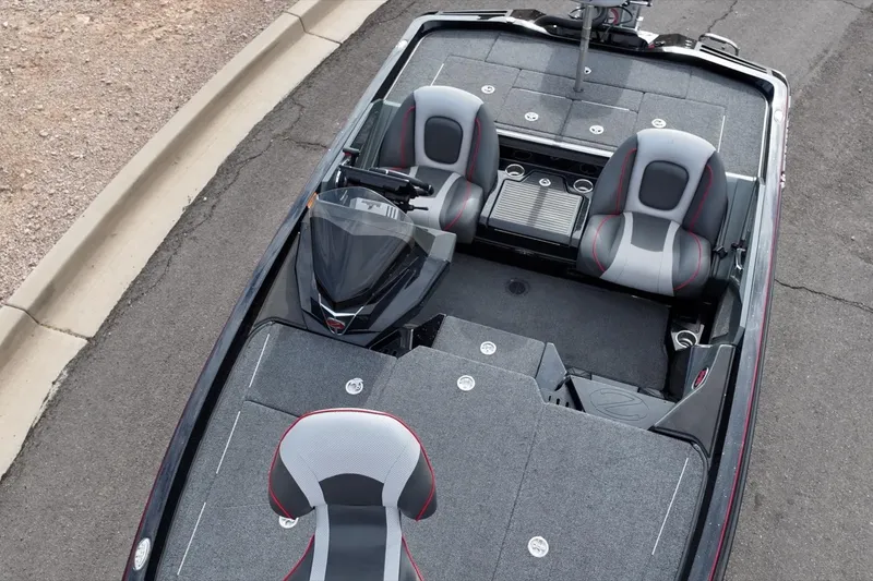 Slide: The Image of 2024 Ranger Z518 boat interior with dual seats and sleek design. - 13