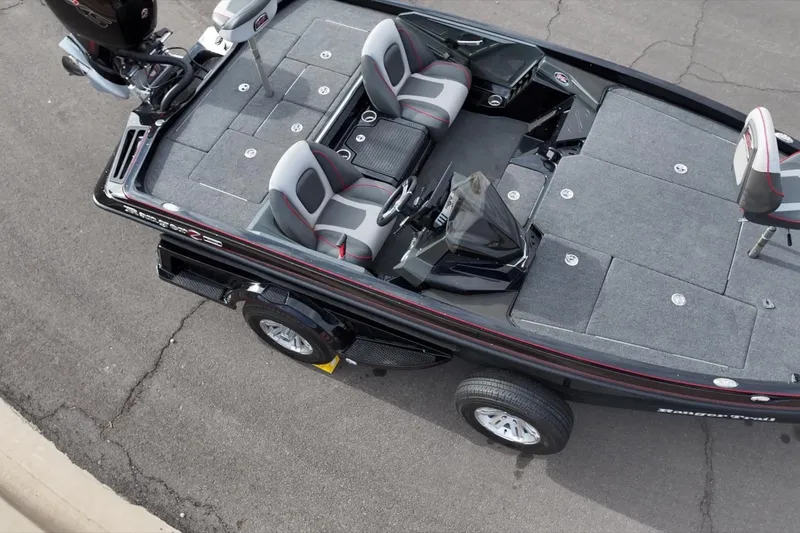 Slide: The Image of 2024 Ranger Z518 boat, aerial view, showcasing seating and deck layout. - 14