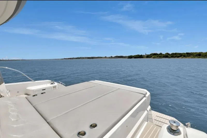 Slide: The Image of 2020 Azimut 51 Atlantis yacht with sleek design on open water. - 17