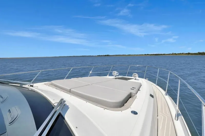 Slide: The Image of Bow view of 2020 Azimut 51 Atlantis yacht on open water. - 25