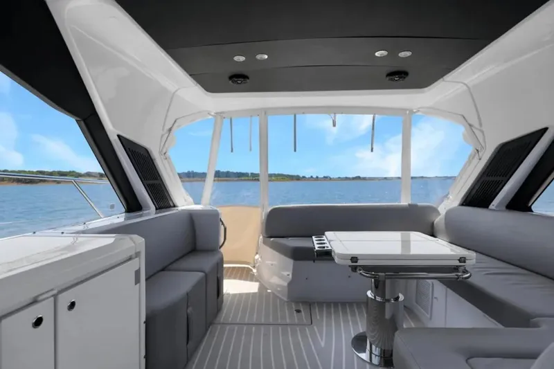 Slide: The Image of Interior of 2020 Azimut 51 Atlantis yacht with modern seating and ocean view. - 28