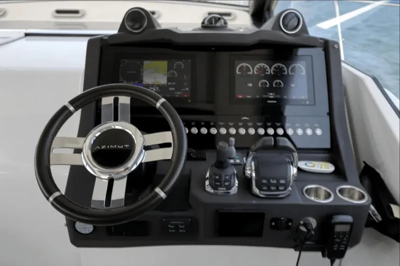 Slide: The Image of Cockpit of 2020 Azimut 51 Atlantis yacht with modern navigation controls. - 35