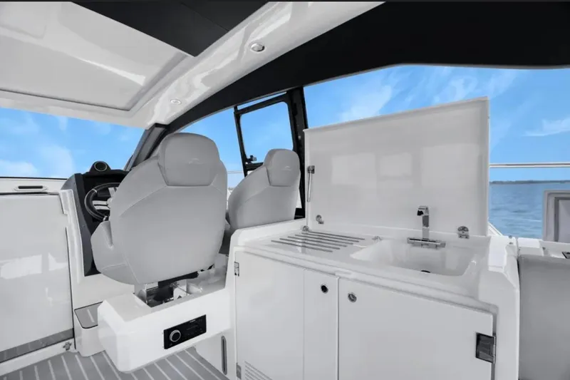 Slide: The Image of Interior of 2020 Azimut 51 Atlantis yacht with modern seating and TV display. - 43