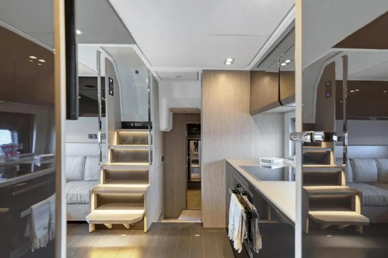Slide: The Image of Interior of 2020 Azimut 51 Atlantis yacht with sleek seating and kitchenette. - 44