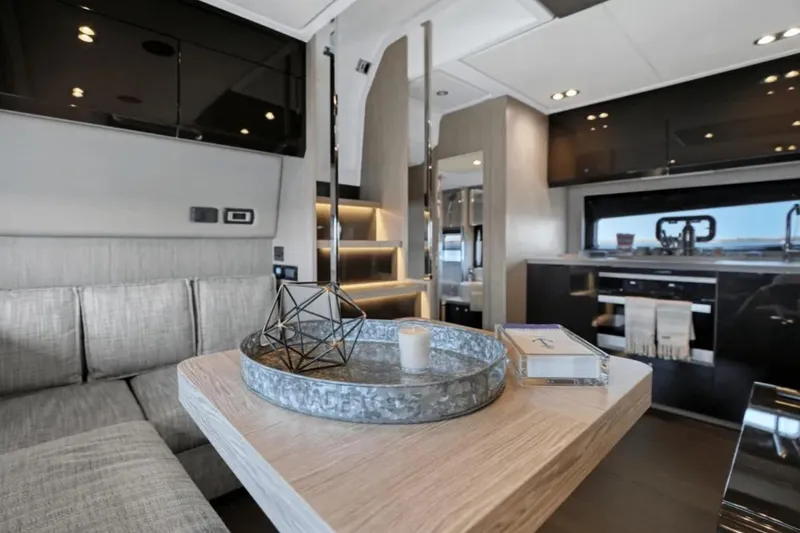 Slide: The Image of Luxurious interior of 2020 Azimut 51 Atlantis yacht with modern kitchen and staircase. - 45
