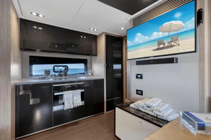 Slide: The Image of Luxurious interior of 2020 Azimut 51 Atlantis yacht with modern kitchen and elegant decor. - 47