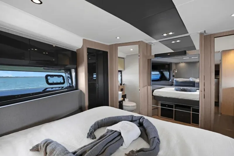 Slide: The Image of Luxurious interior of 2020 Azimut 51 Atlantis yacht with modern bedroom design. - 56