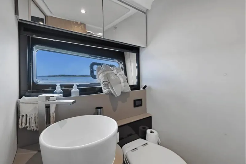 Slide: The Image of Luxurious interior of 2020 Azimut 51 Atlantis yacht with modern bedroom design. - 57