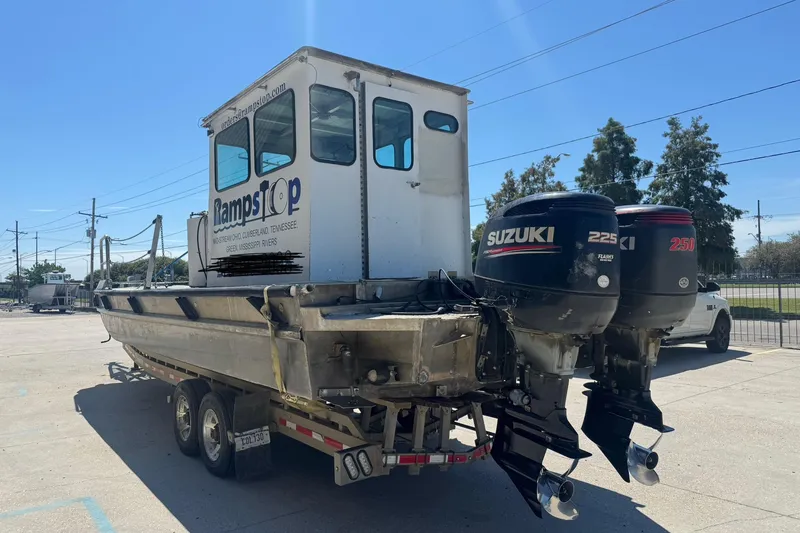 Slide: The Image of Custom Aluminum Work Boat 33, 2010 model, with dual Suzuki outboard motors. - 9