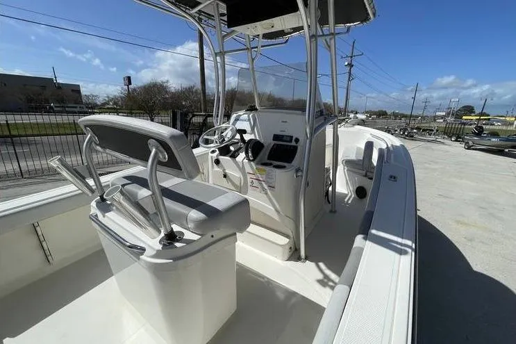 Slide: The Image of 2020 Mako 214 Center Console boat with sleek design and modern features. - 12