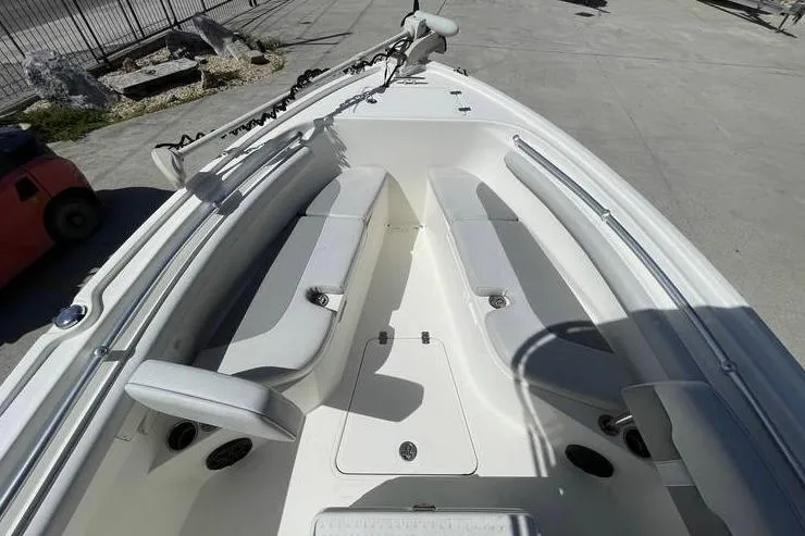 Slide: The Image of 2020 Mako 214 Center Console boat with spacious seating and modern design. - 17