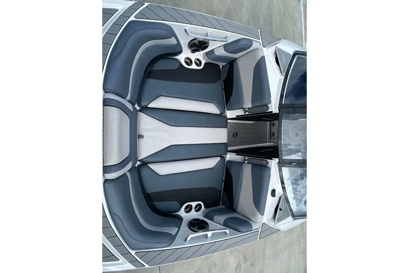 Slide: The Image of 2018 Malibu Wakesetter 22 MXZ interior with gray and white seating. - 5