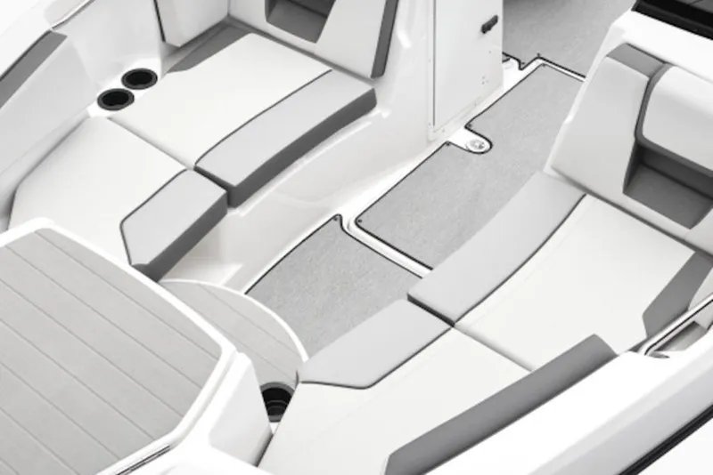 Slide: The Image of 2025 Yamaha Boats AR220 interior with sleek, modern seating and cup holders. - 3