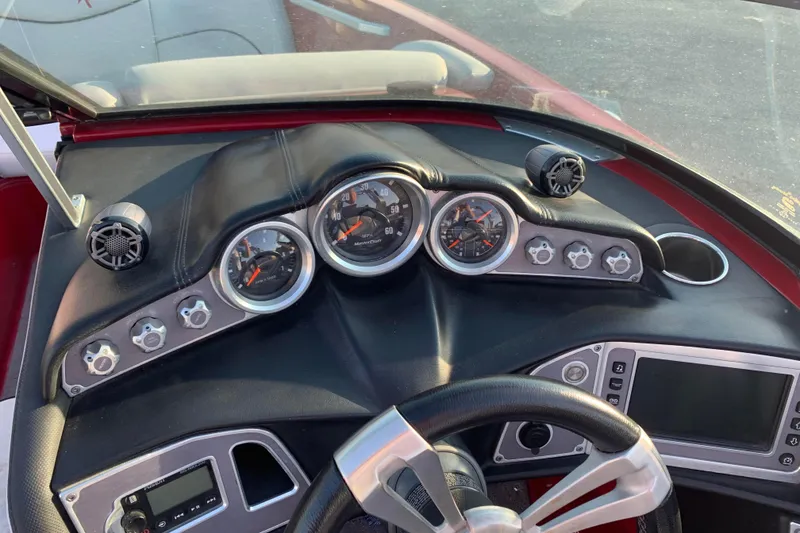 Slide: The Image of Dashboard of a 2017 MasterCraft X23 boat with gauges and controls. - 5