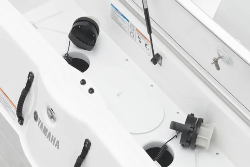 Slide: The Image of 2026 Yamaha Boats AR250 engine compartment with visible components and branding. - 4