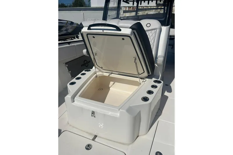 Slide: The Image of 2023 Fountain 38TE CC boat interior, showcasing sleek design and modern features. - 13