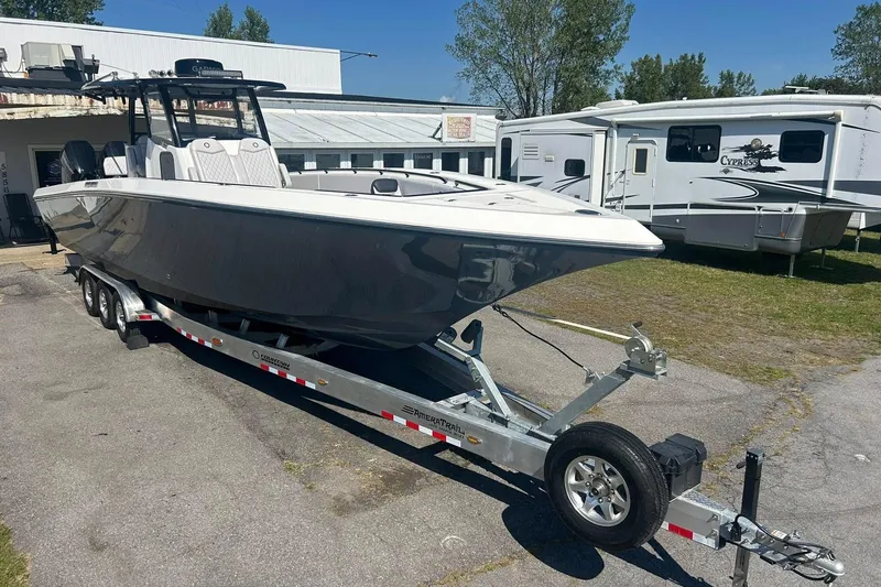 Slide: The Image of 2023 Fountain 38TE CC boat interior with modern helm and seating. - 3