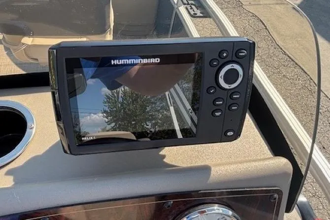 Slide: The Image of Humminbird fish finder on 2024 Sun Tracker Bass Buggy 18 DLX dashboard. - 14