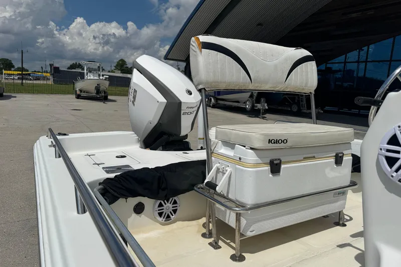 Slide: The Image of 2005 Bay Stealth 2230 boat with Evinrude 200 engine and Igloo cooler on deck. - 13