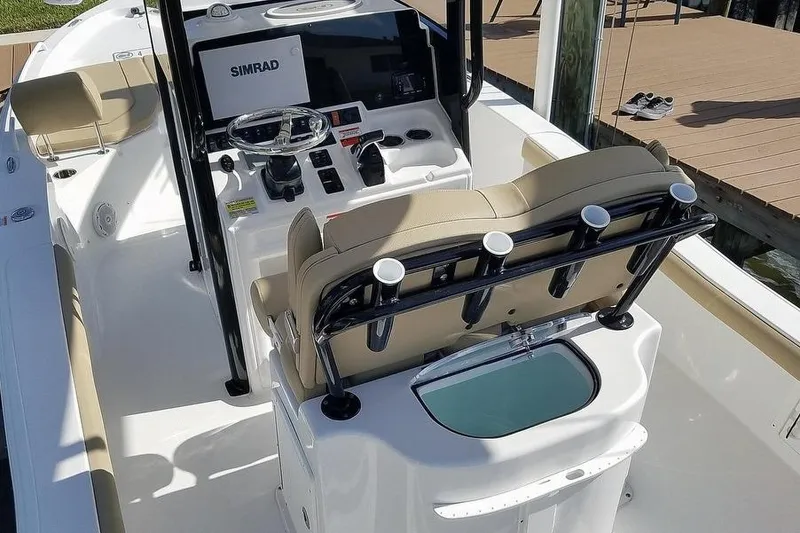 Slide: The Image of 2019 Sea Hunt BX 25 FS boat interior with steering console and seating. - 3