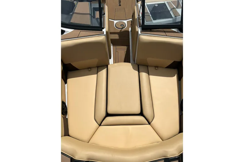 Slide: The Image of 2020 Moomba Max boat interior with tan seating and sleek design. - 2
