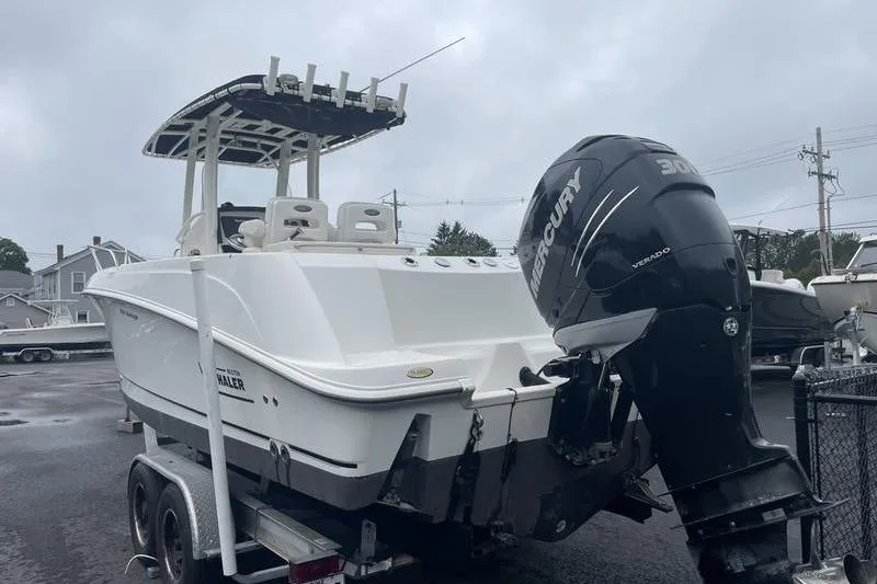 Slide: The Image of 2012 Boston Whaler 250 Outrage boat with Mercury engine on trailer. - 9