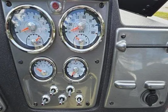 Slide: The Image of Dashboard of 2022 Tracker Pro Guide V-175 WT boat with gauges and controls. - 13