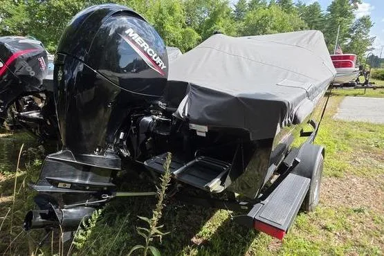 Slide: The Image of 2022 Tracker Pro Guide V-175 WT boat with Mercury outboard engine, covered and on a trailer. - 6