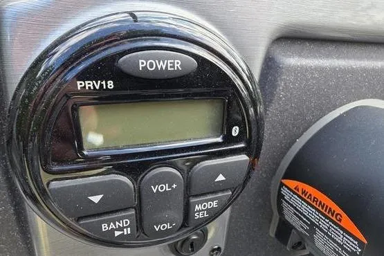 Slide: The Image of 2022 Tracker Pro Guide V-175 WT boat control panel with power and volume buttons. - 9