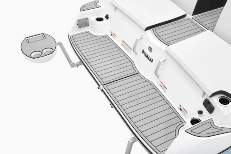 Slide: The Image of 2026 Yamaha Boats 222S swim platform with cup holders and sleek design. - 2