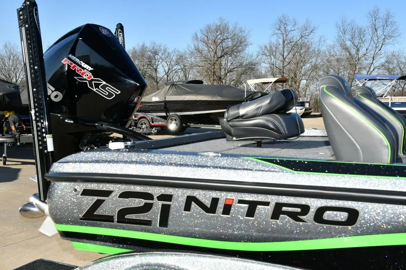 Slide: The Image of 2020 Nitro Z21 Pro boat with Mercury Pro XS engine, parked outdoors. - 1