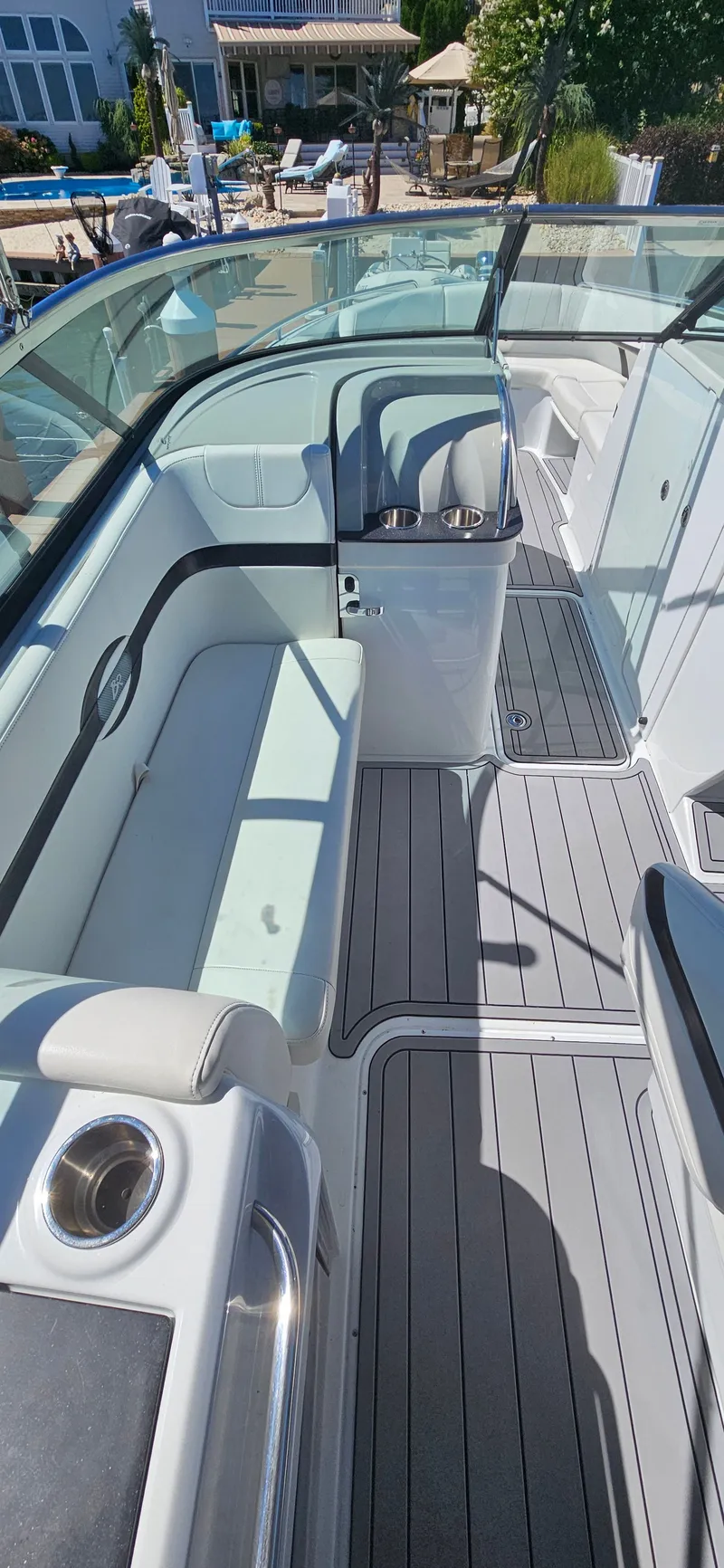 Slide: The Image of 2011 Formula 310 Bowrider interior with seating and sleek design. - 11