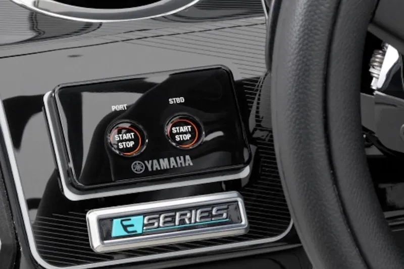 Slide: The Image of 2026 Yamaha Boats 252SE dashboard with start/stop buttons and E-Series branding. - 3